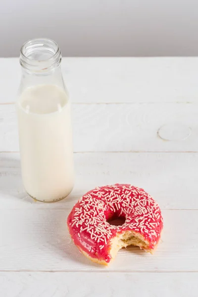 Sweet doughnut and milk — Stock Photo