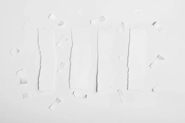 Torn empty white papers — Stock Photo