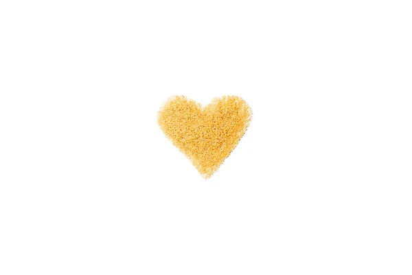 Símbolo del corazón hecho de pasta italiana - foto de stock