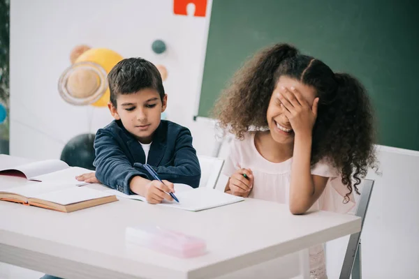 Multiethnic pupils at school — Stock Photo