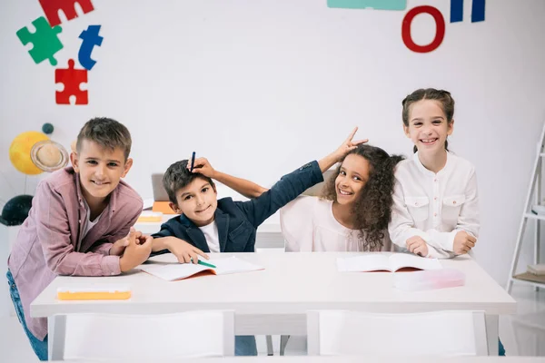 Multiethnic pupils at school — Stock Photo