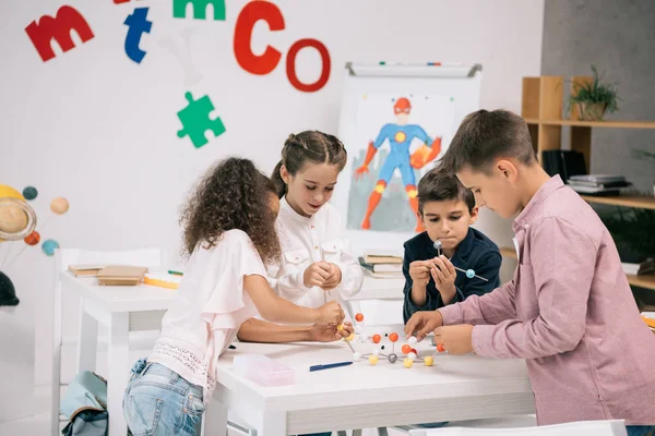 Pupils at chemistry lesson — Stock Photo