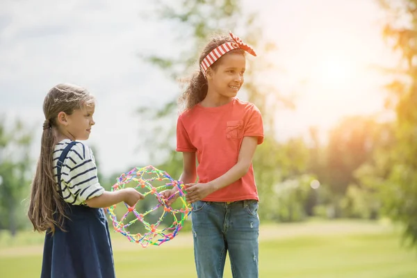 Multiethnic children playing in park — Stock Photo