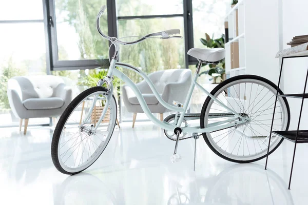 Bicycle in modern office — Stock Photo