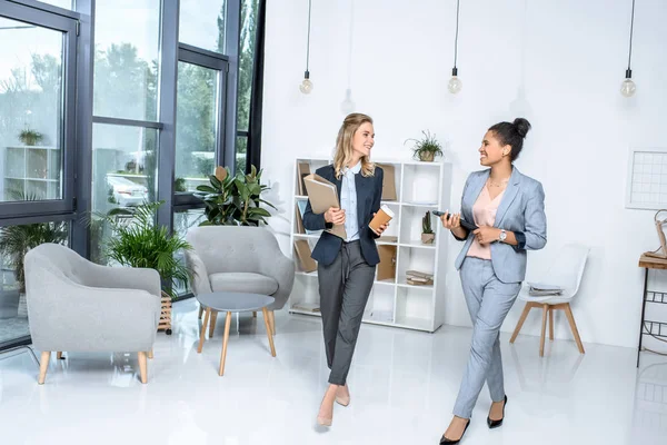 Multicultural businesswomen in office — Stock Photo