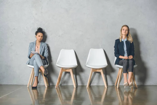 Multicultural businesswomen waiting for interview — Stock Photo
