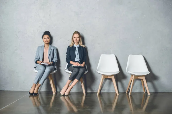 Multicultural businesswomen waiting for interview — Stock Photo