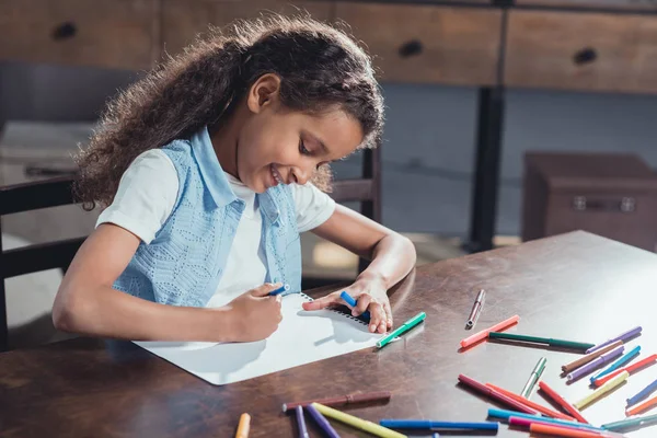 African american girl drawing picture — Stock Photo