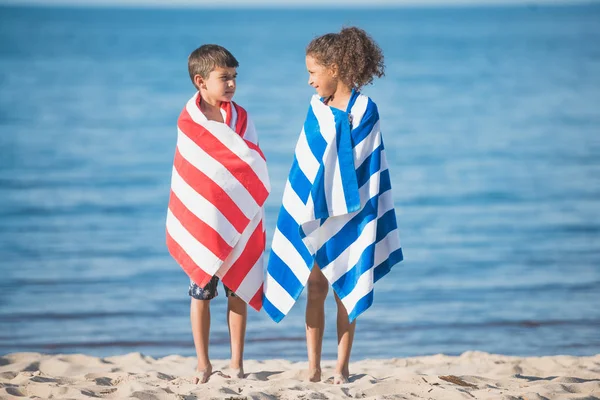 Multicultural children at seaside — Stock Photo