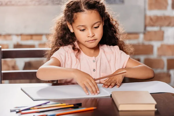 African american girl drawing at home — Stock Photo