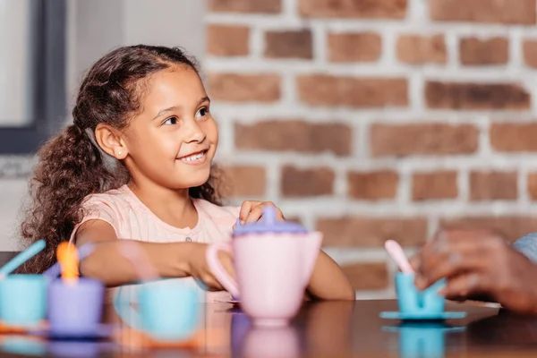 African american girl at tea party — Stock Photo