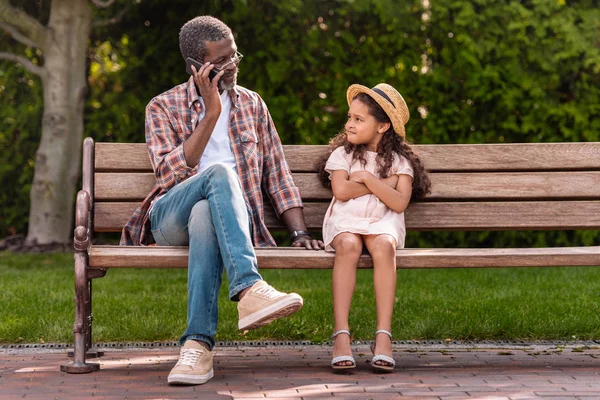 Grandfather and dissatisfied granddaughter — Stock Photo