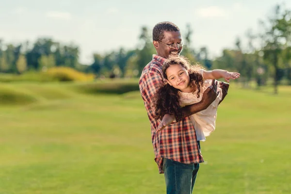 Grandfather playing with granddaughter — Stock Photo