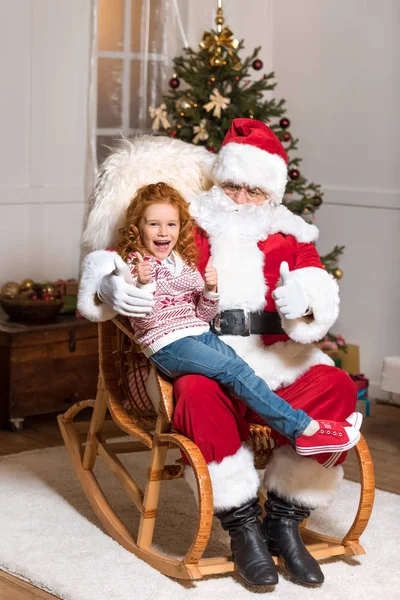 Papai Noel e criança — Fotografia de Stock