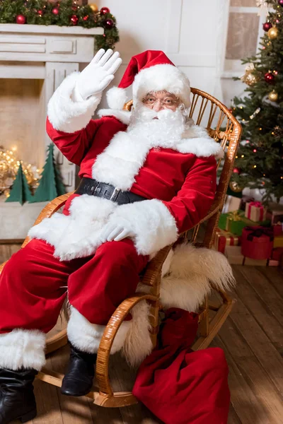 Santa claus in rolling chair — Stock Photo