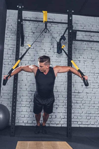 Man exercising with resistance bands — Stock Photo