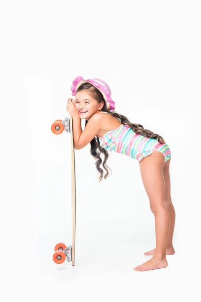 Beautiful child with skateboard — Stock Photo