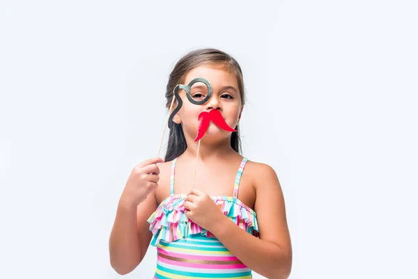 Adorable niño con palos de fiesta - foto de stock