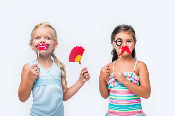 Entzückende Kinder mit Party-Stöcken — Stockfoto