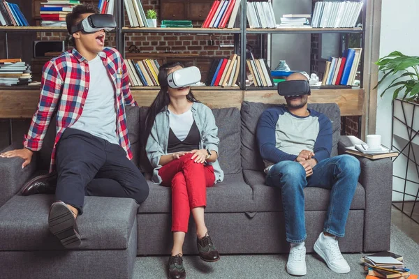 Multiethnic friends in vr headsets — Stock Photo