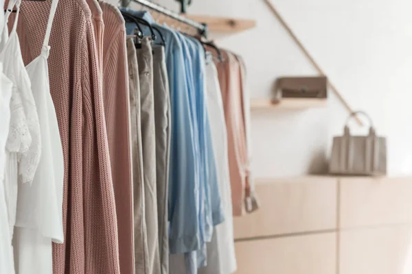 Rack with clothes in store — Stock Photo