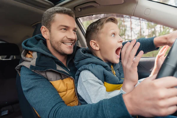 Father and son in car — Stock Photo