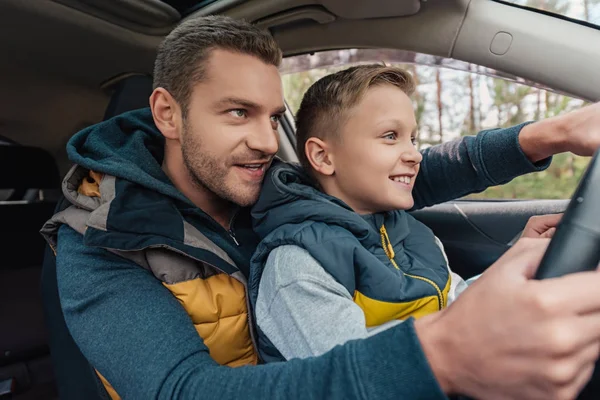 Father and son in car — Stock Photo