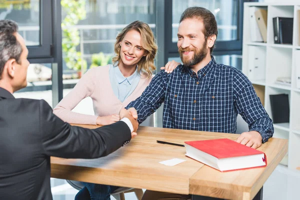 Couple having meeting with lawyer — Stock Photo