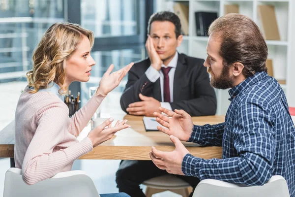 Couple arguing at lawyer office — Stock Photo