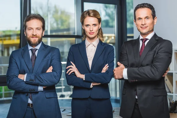 Lawyers with arms crossed — Stock Photo