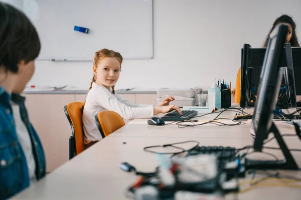 Happy kids working together at machinery class, stem education concept — Stock Photo