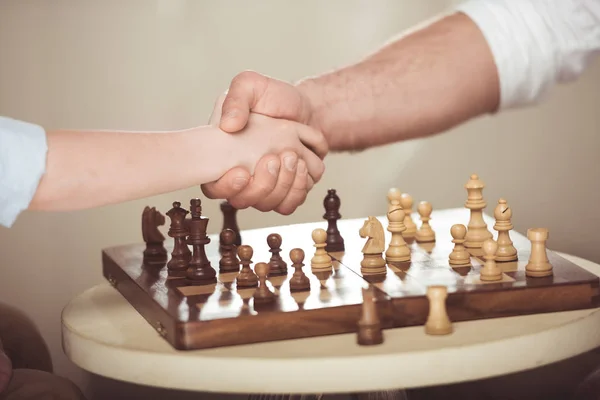 Father and son shaking hands — Stock Photo, Image