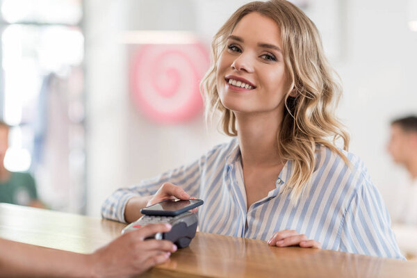 woman paying for purchase