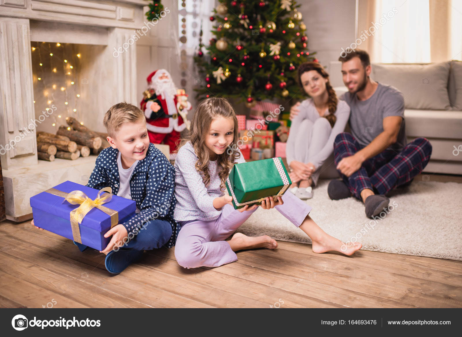Kids with christmas presents — Stock Photo © GeneGlavitsky #164693476