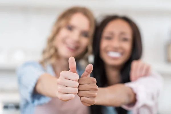 Waitresses with thumbs up gesture — Stock Photo