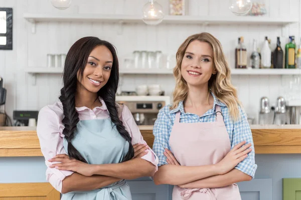 Multiethnic waitresses at cafe — Stock Photo