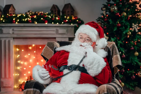 Santa claus talking on phone — Stock Photo