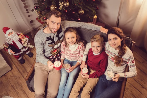 Family with cups of cacao at home  marshmallow — Stock Photo