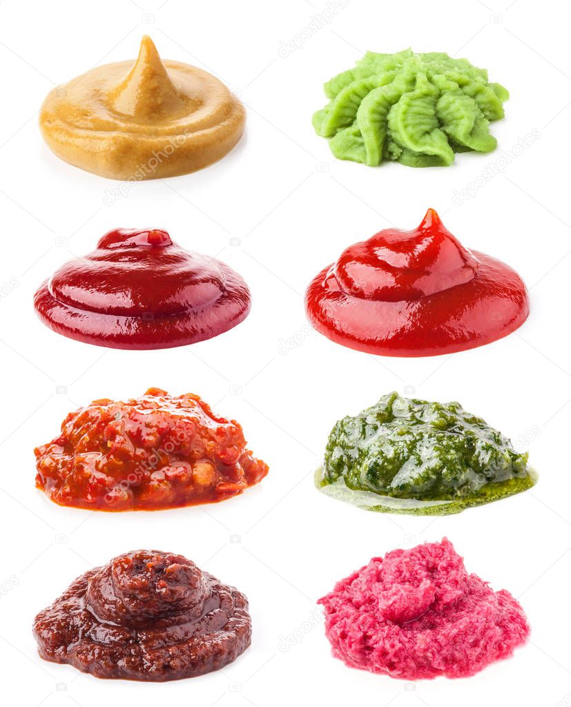 Various sauces isolated on white background