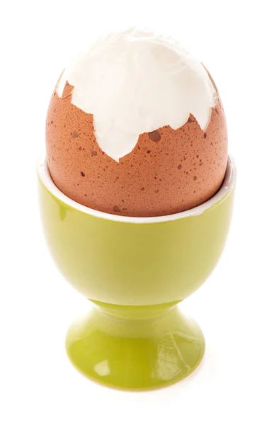 Light boiled egg in egg cup isolated on white — Stock Photo, Image