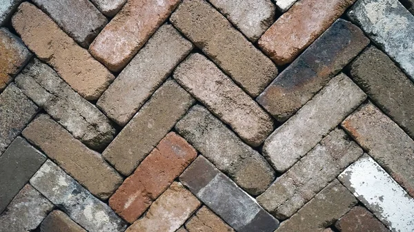 Arka plan ve tuğla duvar kağıdı bir zikzak biçimde duvar