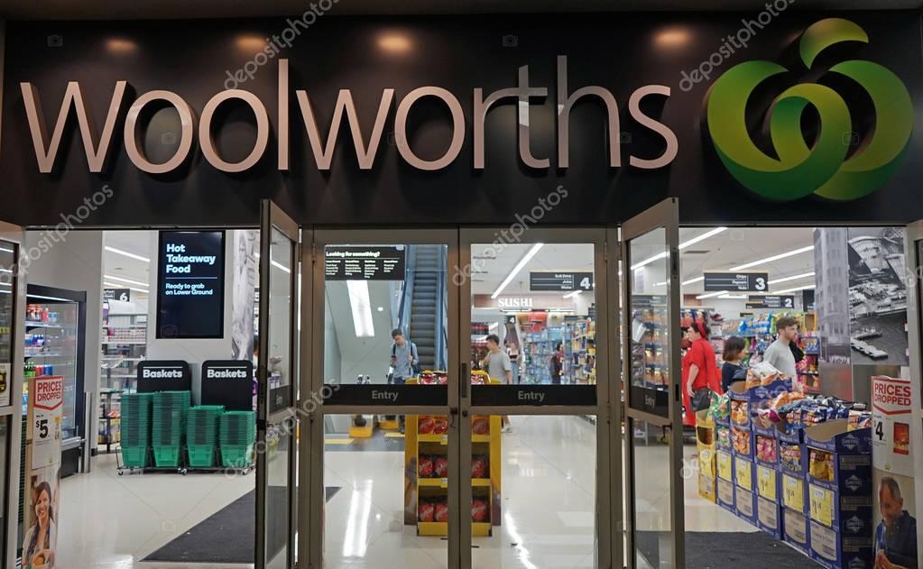 Sydney, Australia - November 03, 2017: Unidentified people shop at Woolworths Supermarket in Sydney. Woolworths is Australian grocery store chain, along with Coles together accounting for about 80% of Australian market.