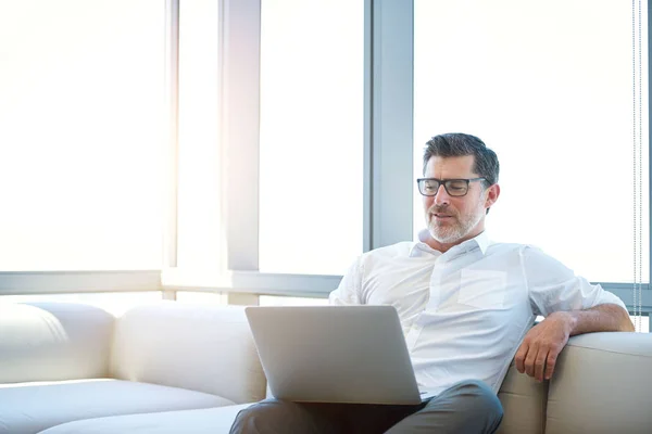 Handsome Mature Designer Wearing Spectacles Sitting Comfortably Couch While Working — 图库照片