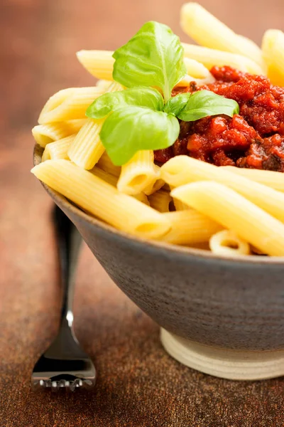 Penne pasta with tomato bolognese sauce — Stock Photo, Image