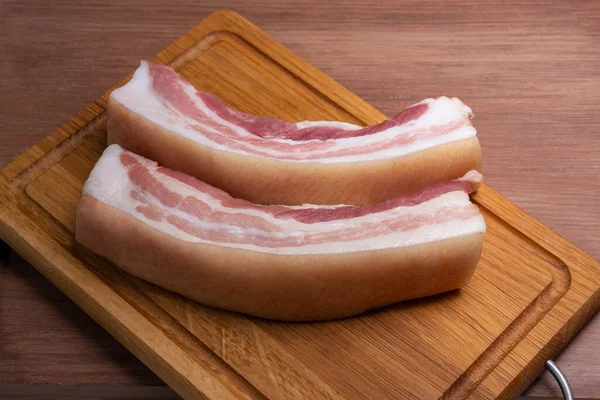 Dois pedaços de barriga de porco fresca — Fotografia de Stock