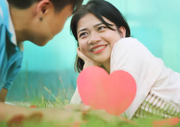 Romantic young couple showing love and care at the park,valentines day