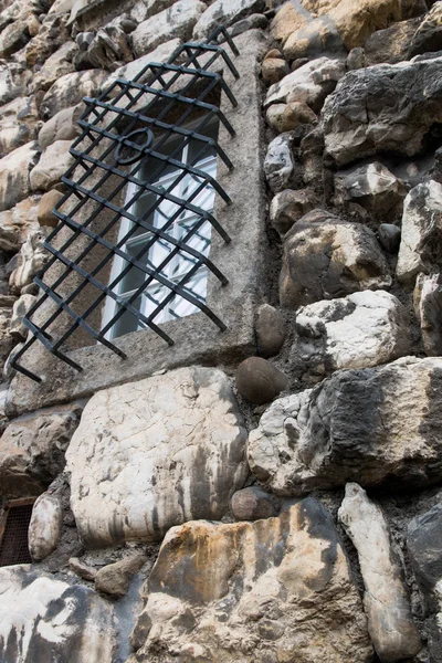 Old stone wall with window. — Stock Photo, Image