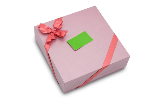 Gift box with ribbon bow and paper tag, isolated on white — Stock Photo, Image