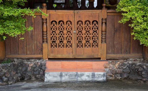 Front view of entrance wood carved door, thai style — Stock Photo, Image