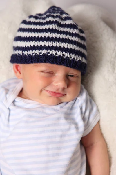 Smart cute baby winking — Stock Photo, Image